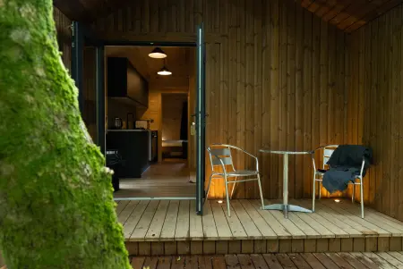 a cosy self-catering woodland cabin for two at Inish Beg Estate
